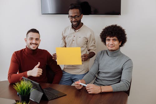 Office Team Smiling at the Camera