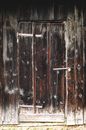 Brown Wooden Door With Silver Hinges