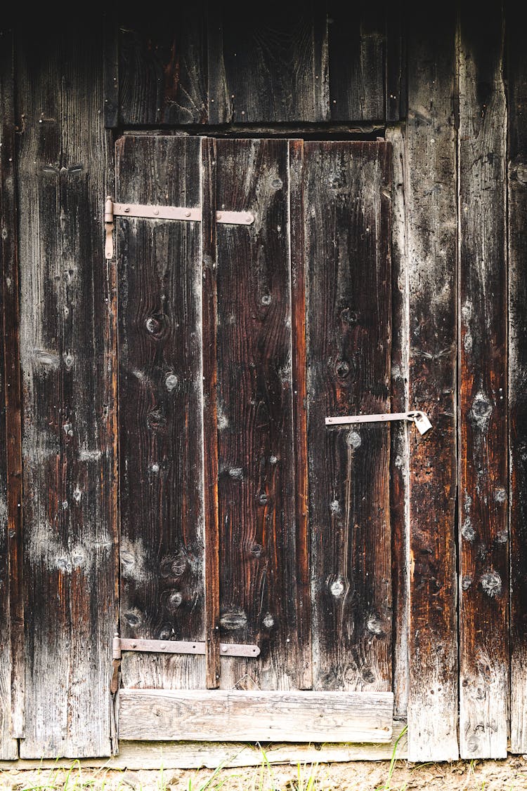 Brown Wooden Door With Silver Hinges