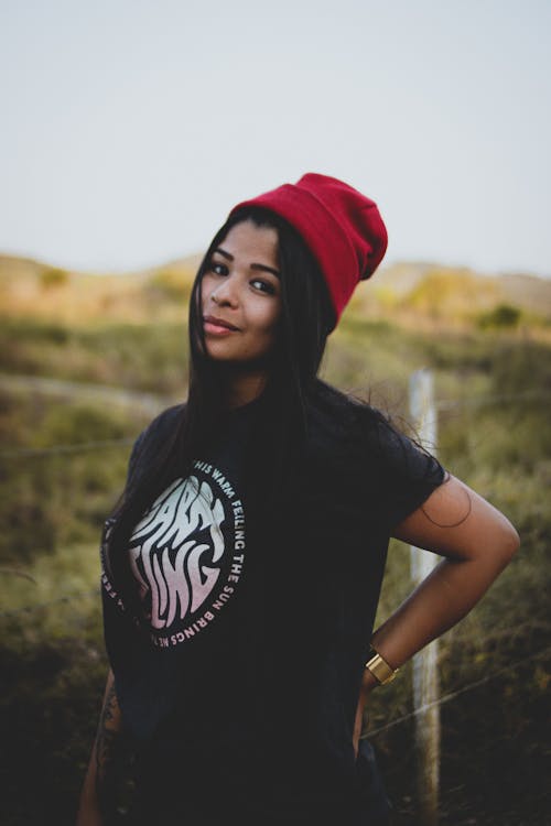 Woman in Black Crew Neck T-shirt amd Red Beanie