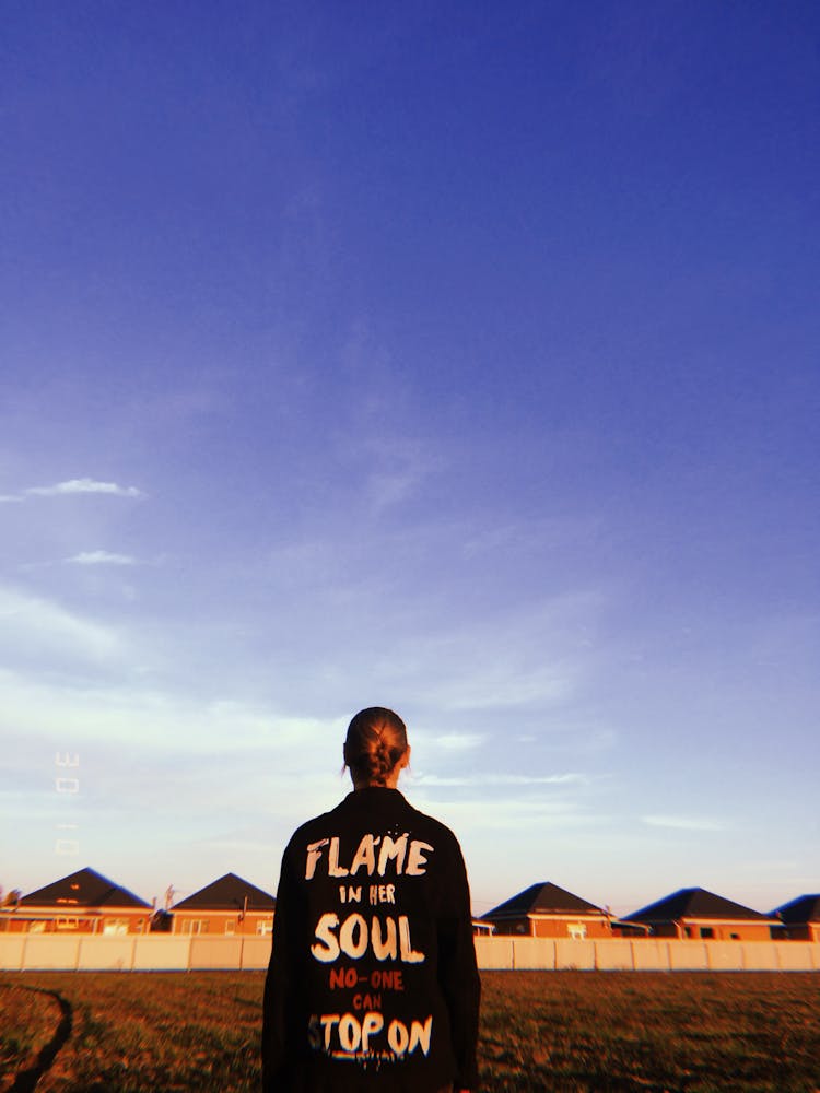 Person In Black Clothing Under Blue Sky