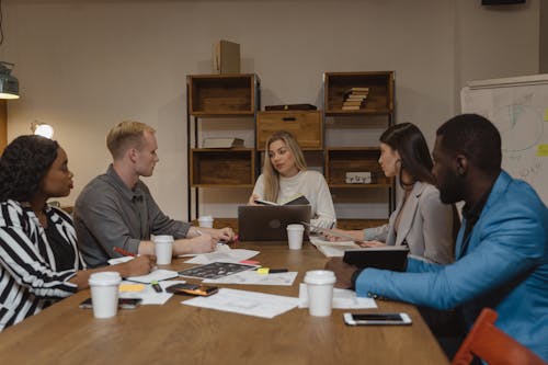 Free Group of People Having a Meeting Stock Photo