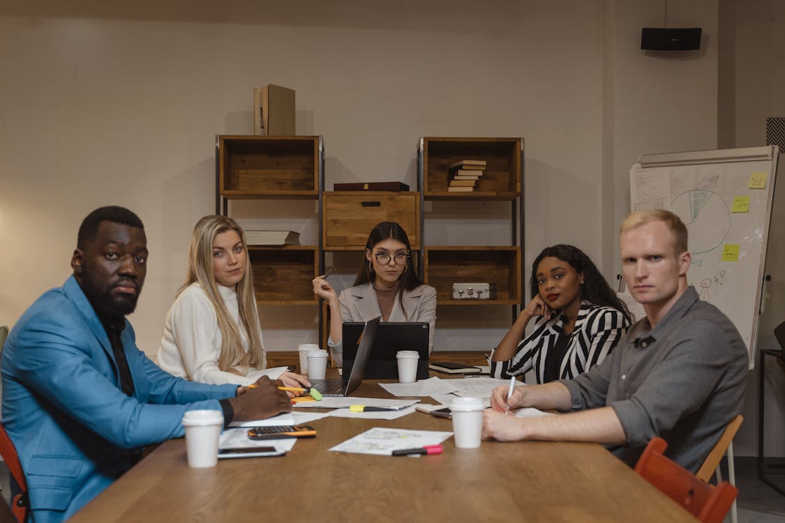 Serious People Sitting at the Table