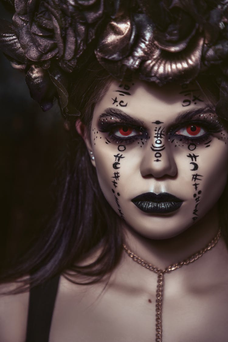 Spooky Woman With Makeup Of Spells