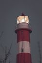 Red and White Concrete Tower