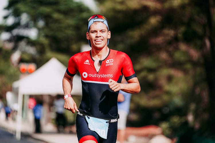 Young Happy Sportsman Running Marathon Fast