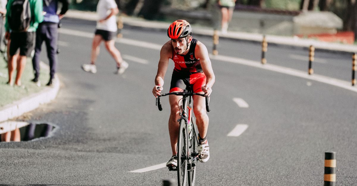 Man Running To Rides Strong man riding bicycle during race · Free Stock Photo