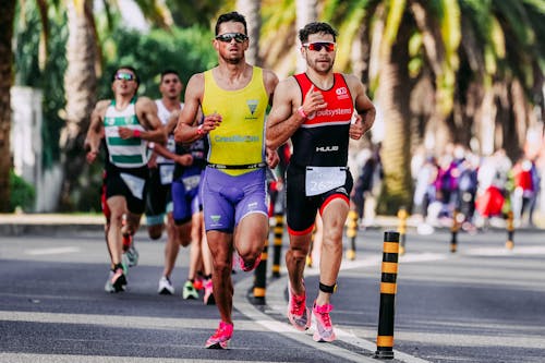 Group of athletes running fast during race