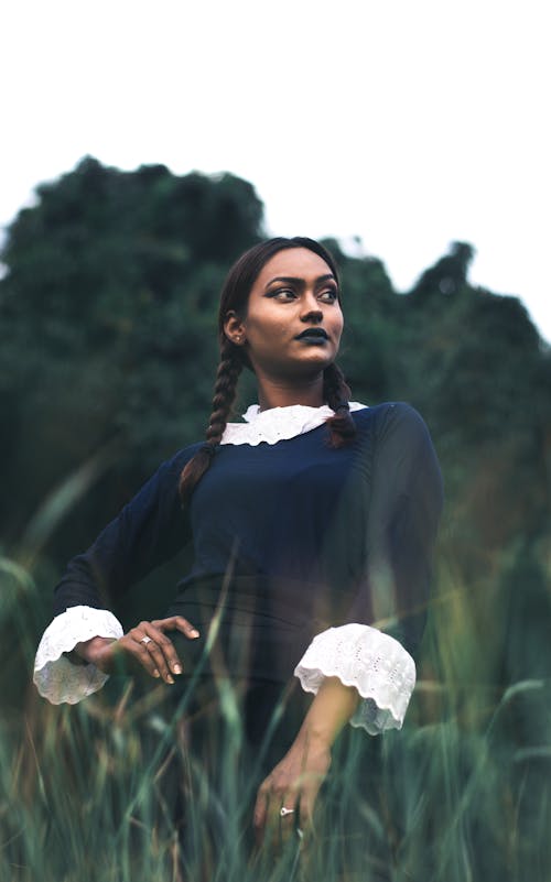 Portrait of a Woman Standing in a Field