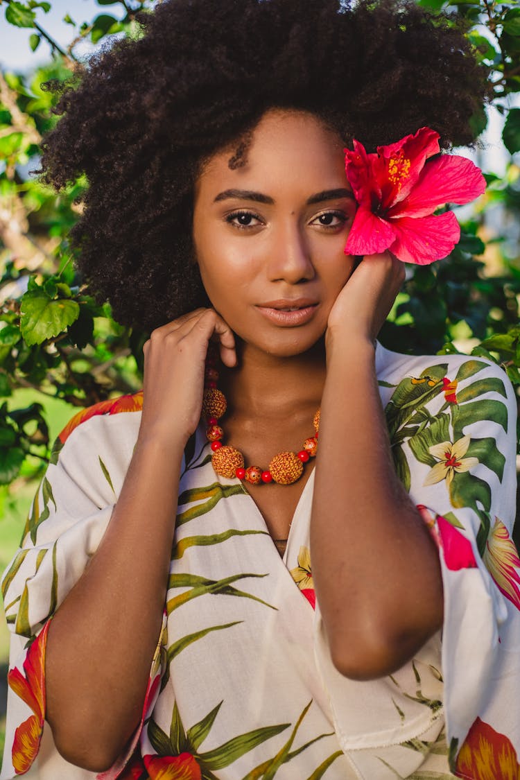 Crop Stylish Black Woman With Flower In Summer Garden