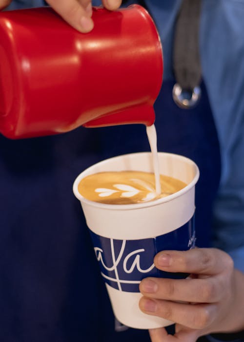 Free Latte Art on Brown Coffee Foam Stock Photo