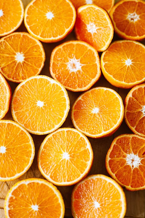 Free Sliced Orange Fruits on Flatlay  Stock Photo