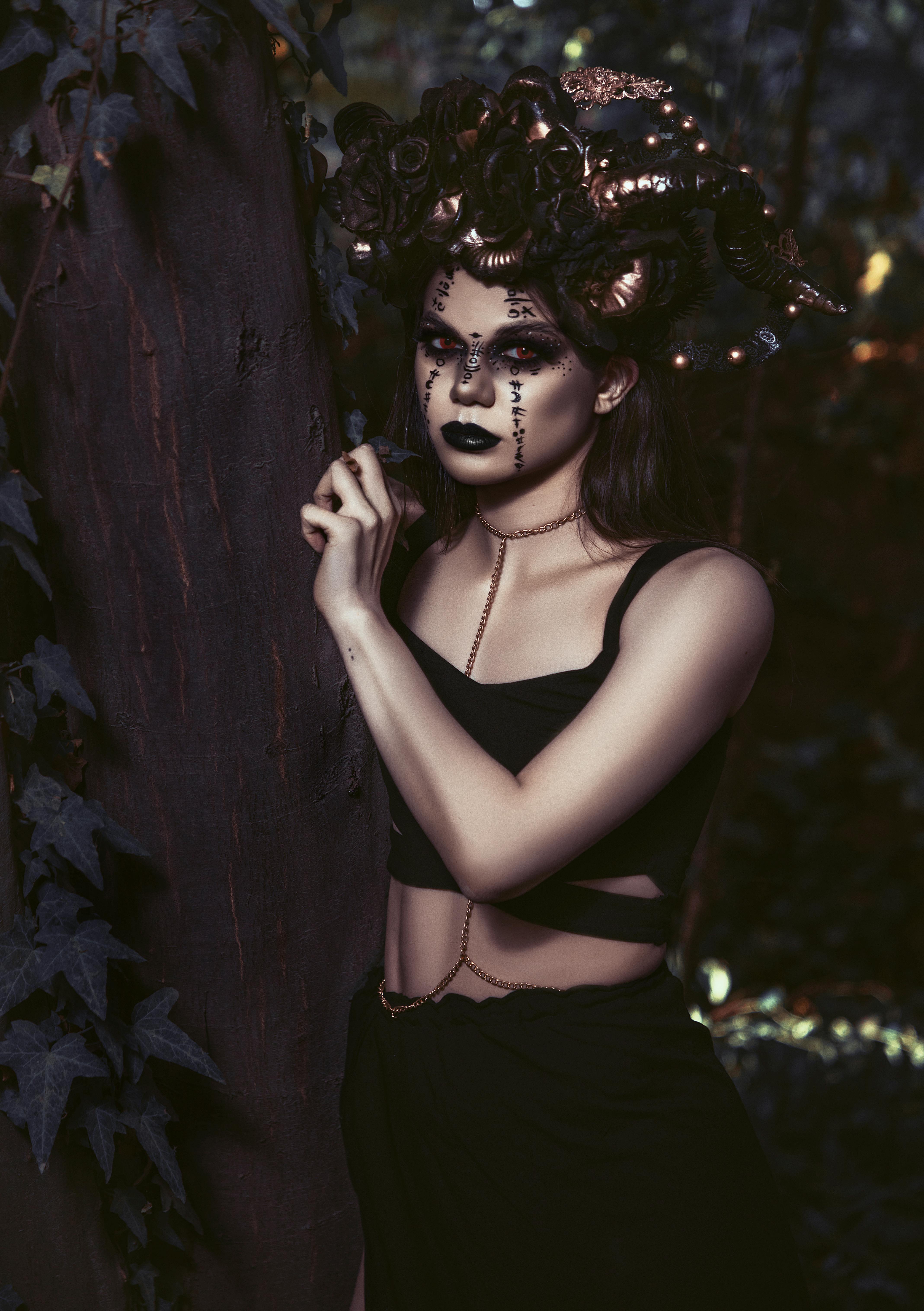 Young woman in gothic outfit and dark makeup · Free Stock Photo