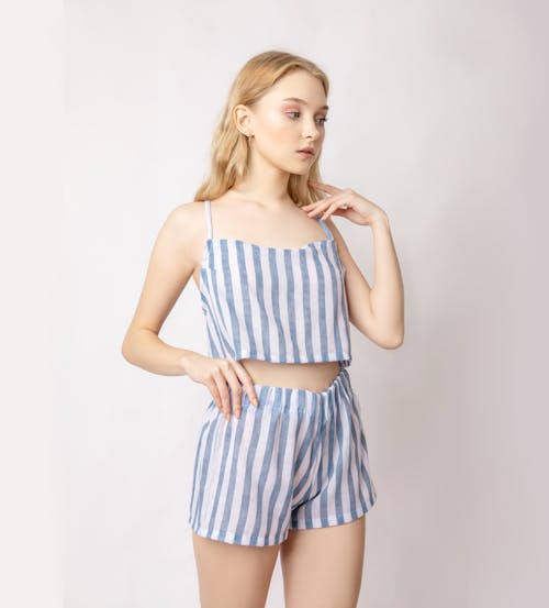 Female model in striped outfit in studio