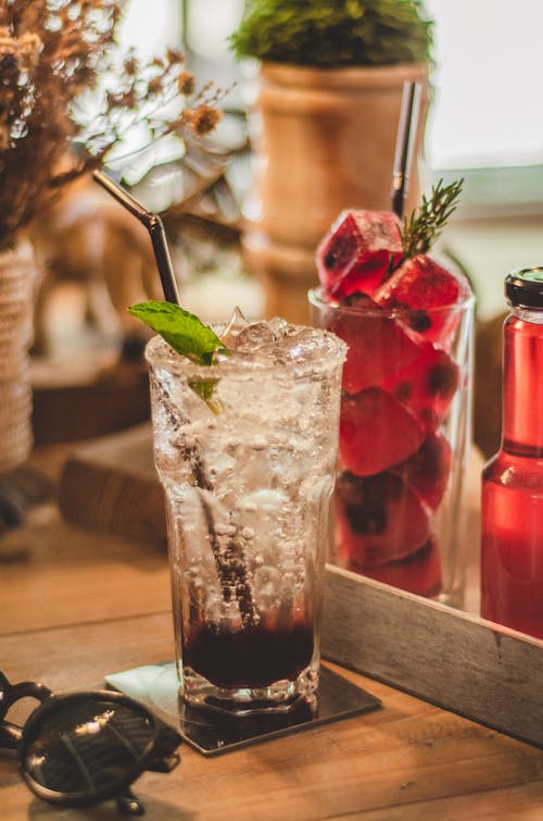 Free Clear Icy Drink with Leaf on Glass Stock Photo