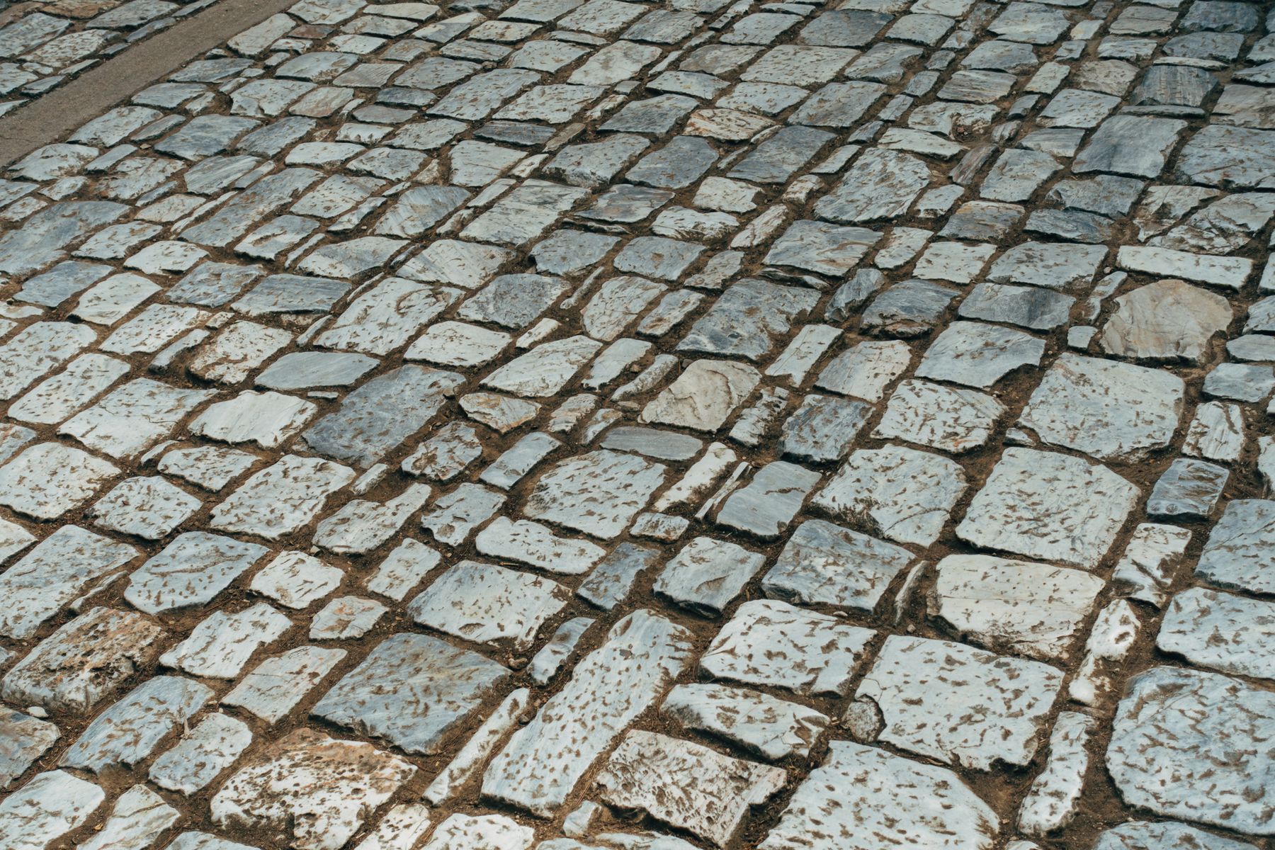 Textured cobblestones made from reclaimed natural stone