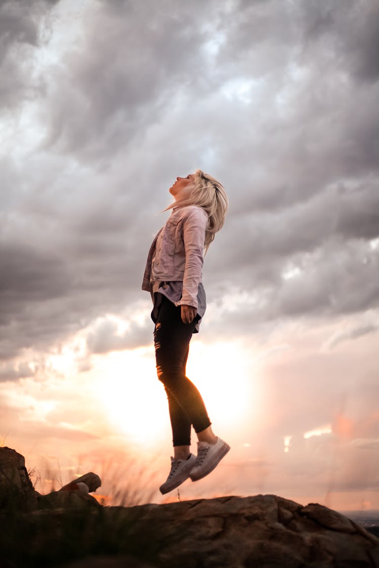 Woman Levitation Photo From A Rock Formation