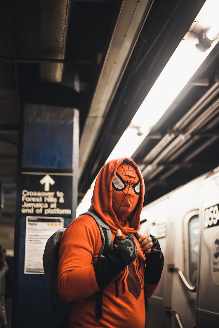 A Person Wearing Spider Man Costume