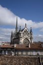 A Concrete Church Under the Blue Sky and White Clouds