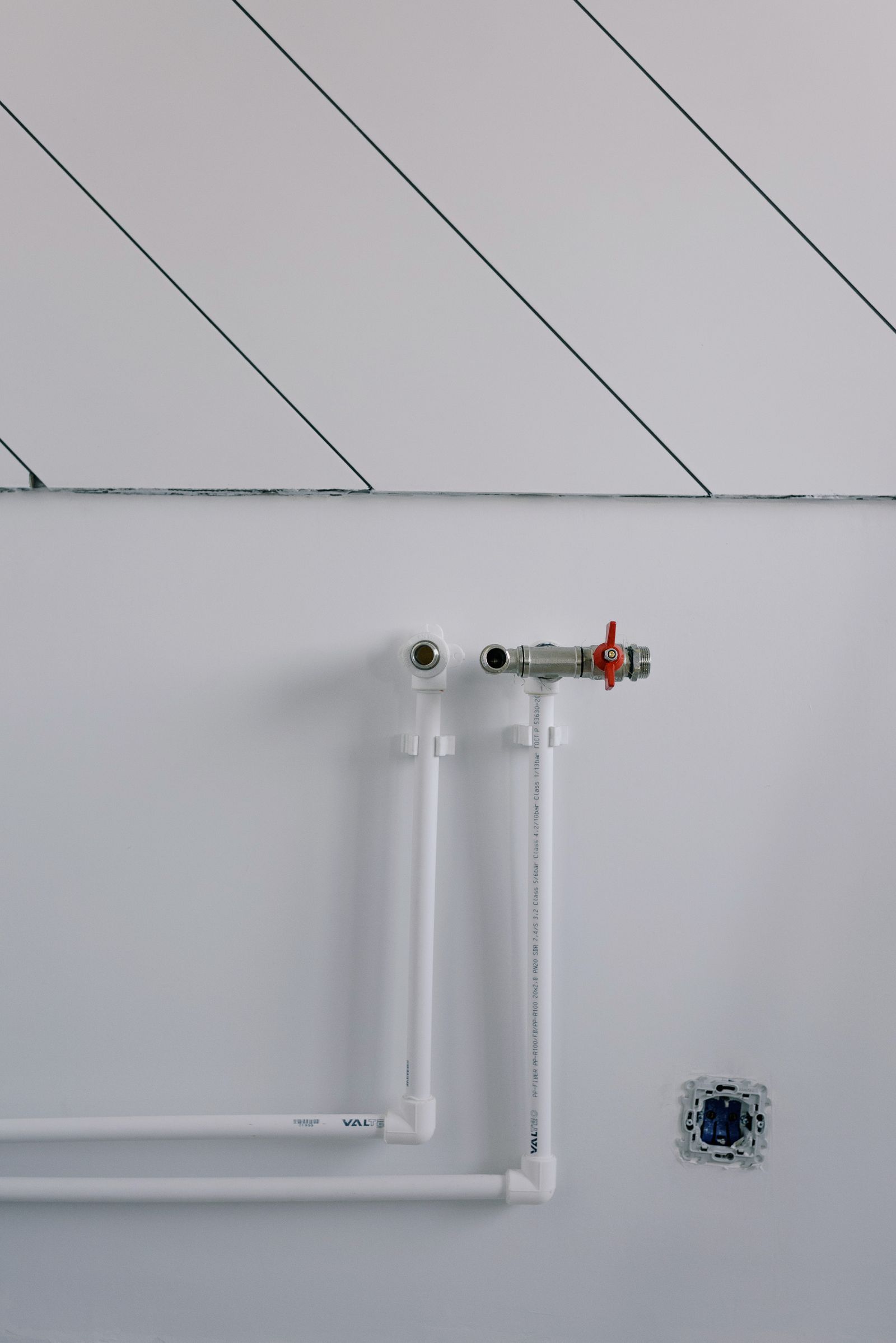 Modern heating pipework and radiator detail