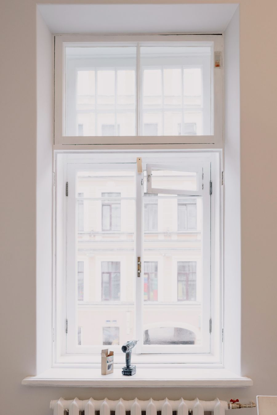 Newly installed impact window in a renovated room