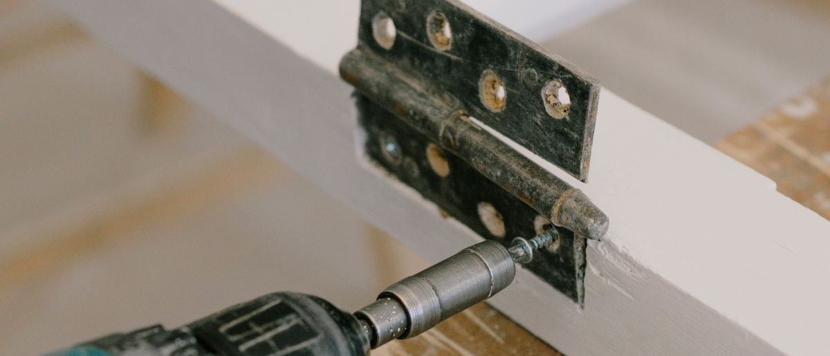 Lower portion of an exterior door where a kick plate is installed