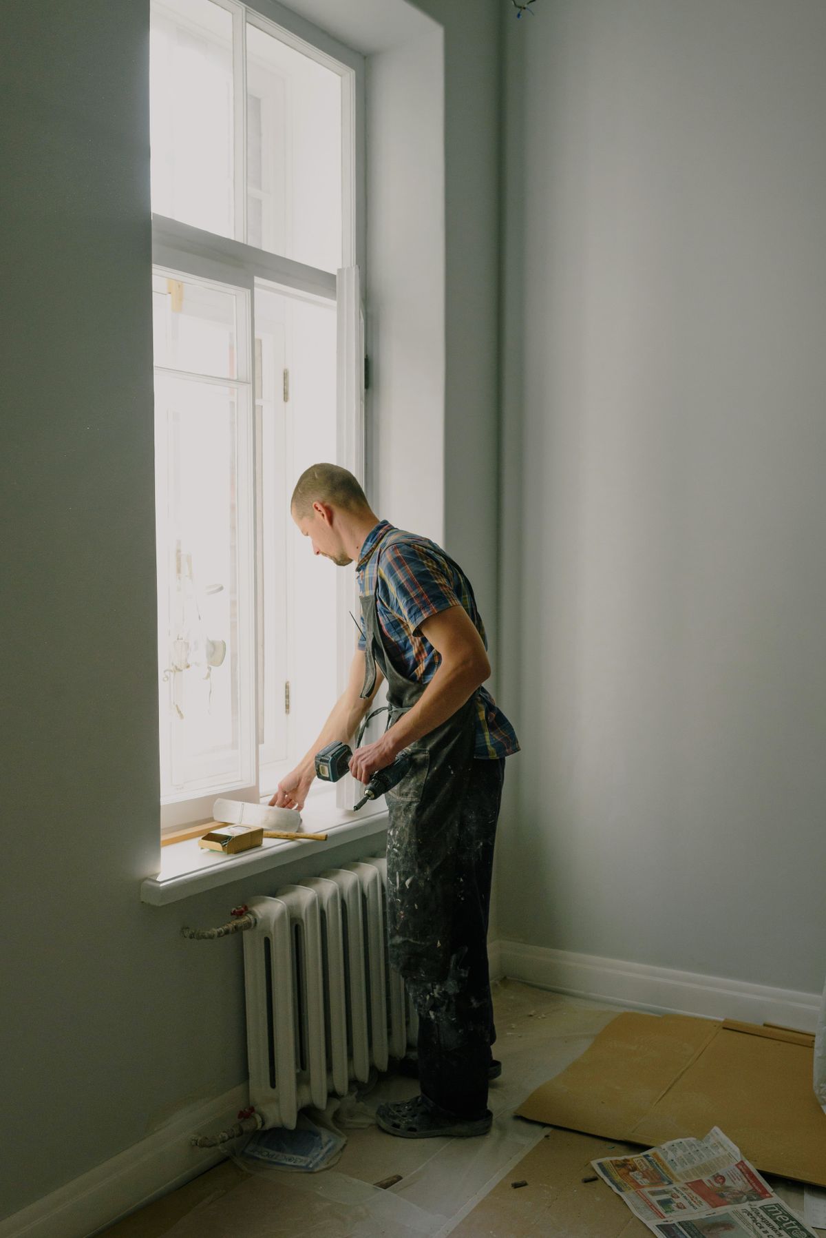 Technician working with home maintenance equipment