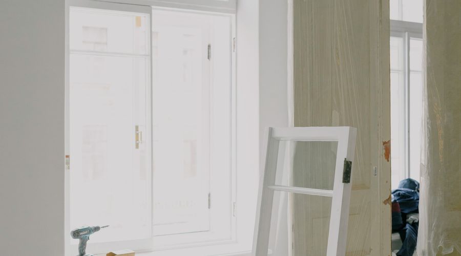 Fresh coat of paint dramatically transforming a dull room into a bright space