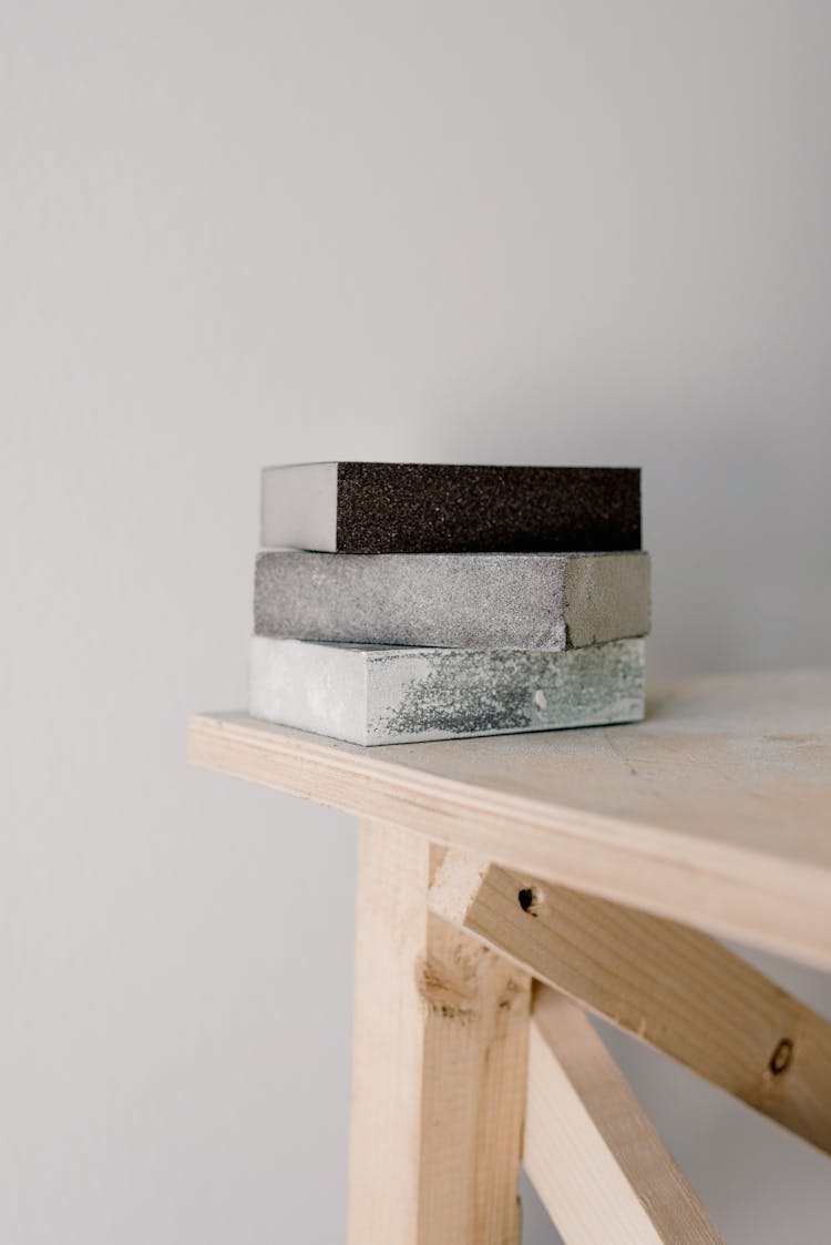 Stack Of Various Bricks On Table