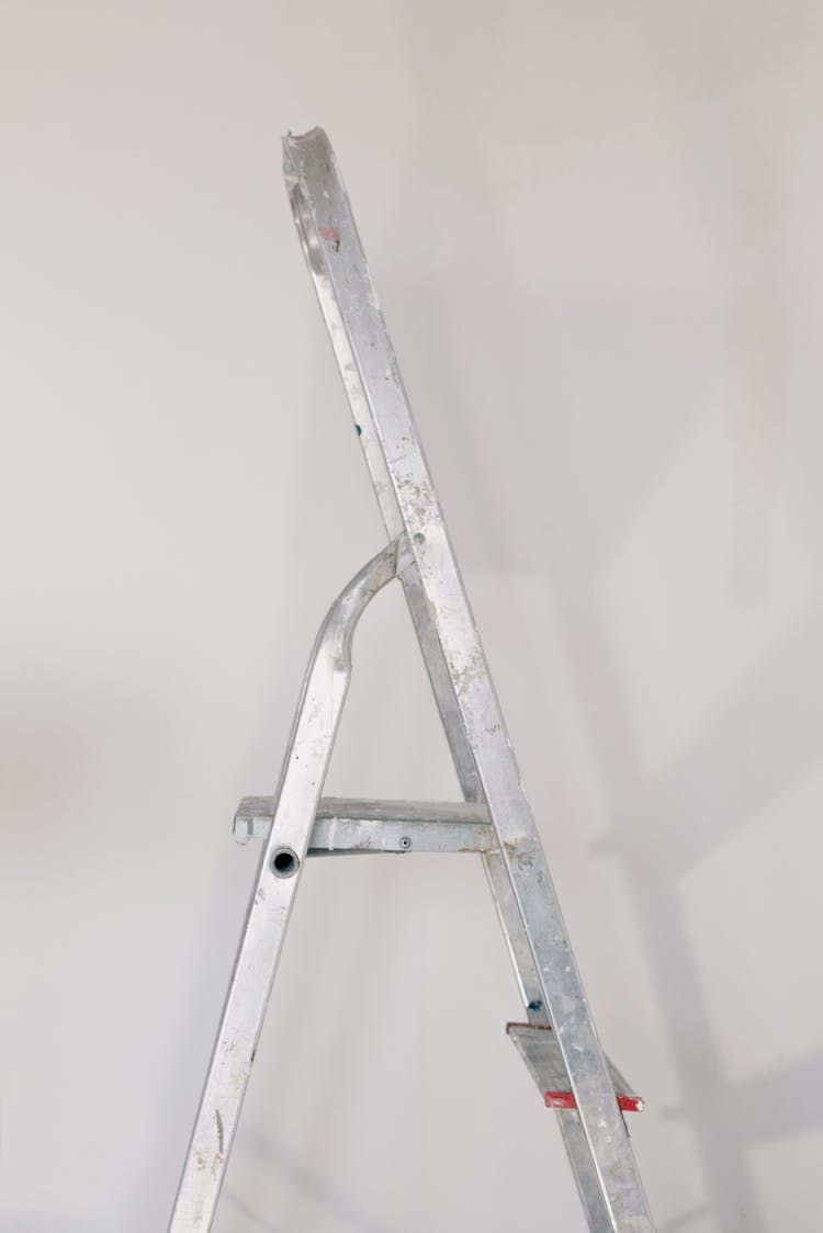 Metal Ladder Near Wall At Home