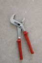 Pliers for repair on stone floor
