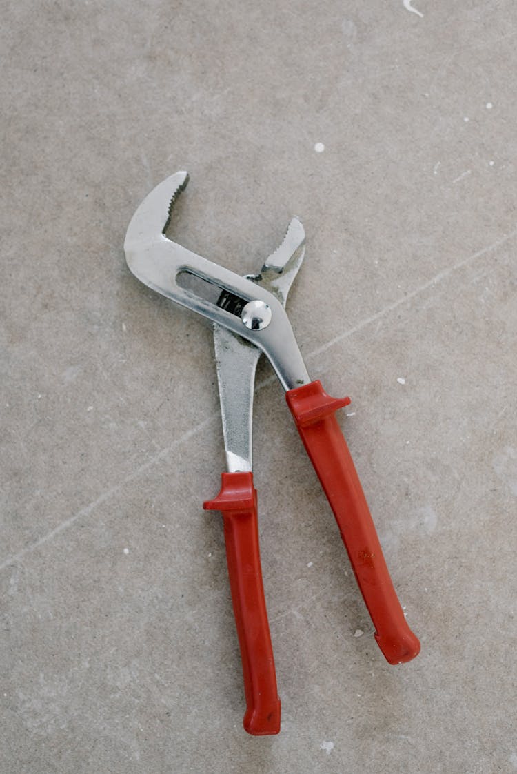 Pliers For Repair On Stone Floor