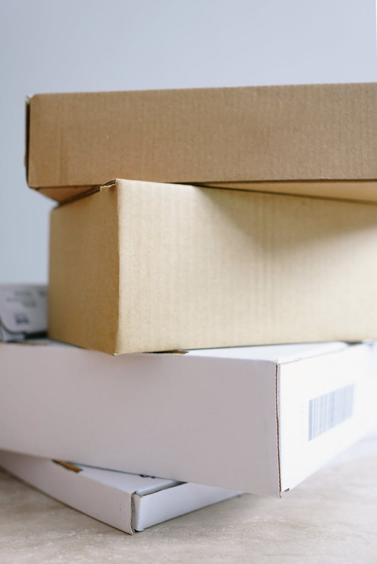 Stack Of Carton Boxes On Table