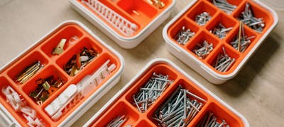 Technician working on mechanical system — RV slide-out repair