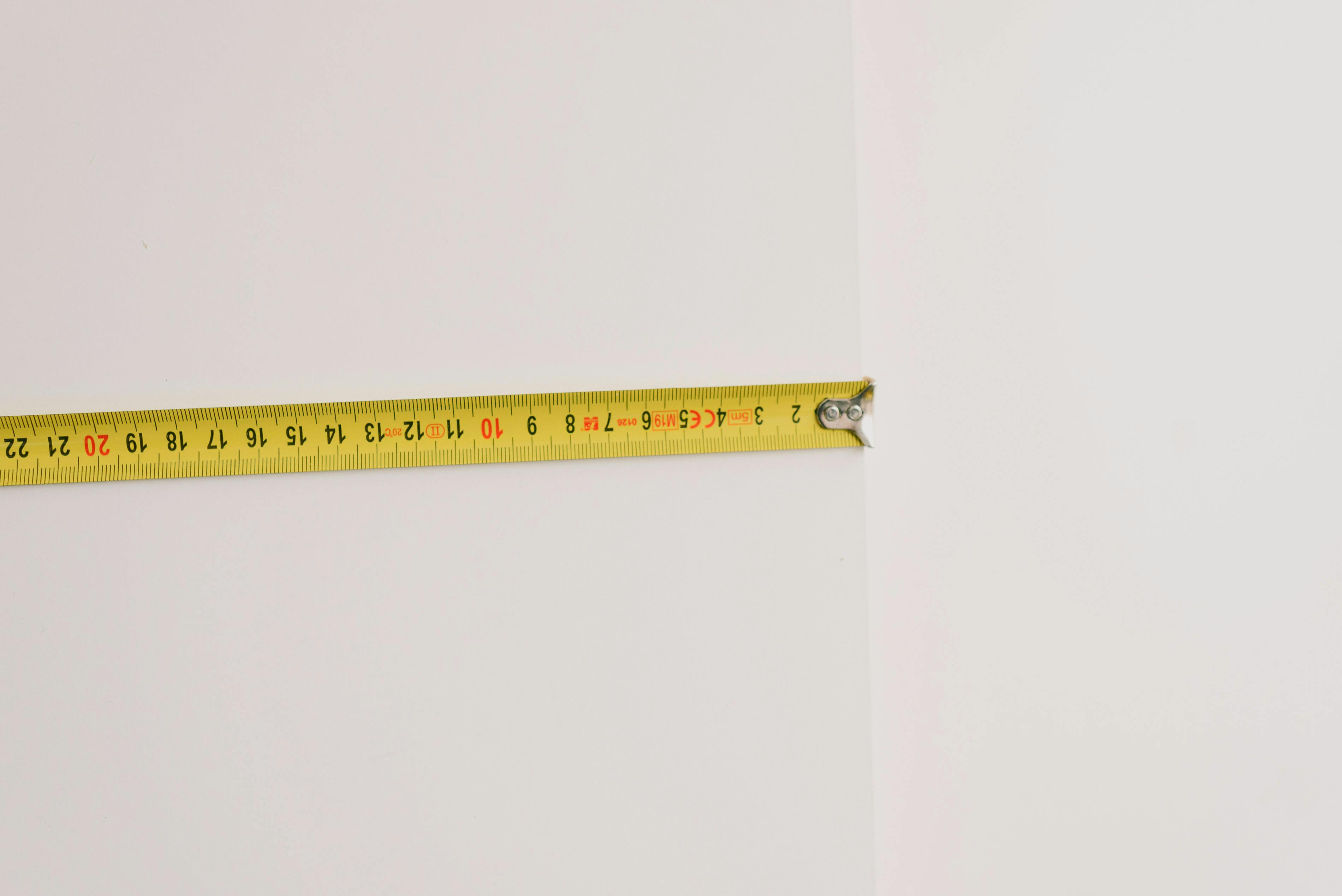 measuring tape on empty white background