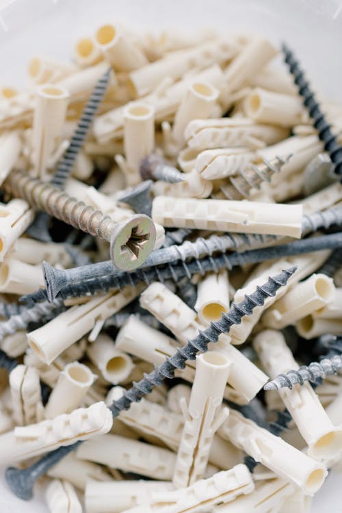 Heap of wall dowels and screws