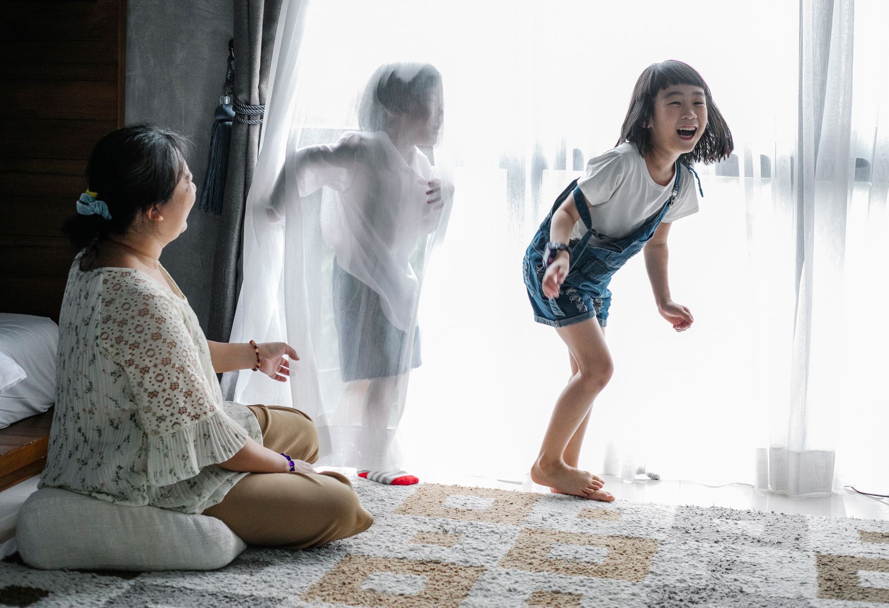 Nanny caring for children in a family home