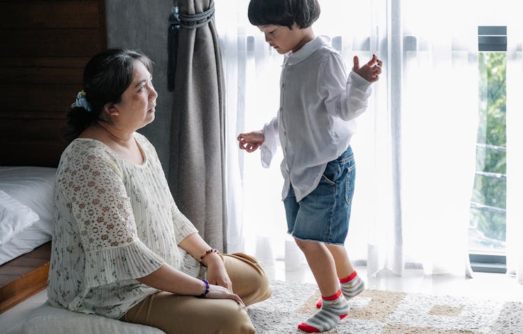 Mother Spending Time With Son At Home