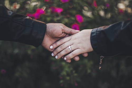 Close up of Couple Holding Hands