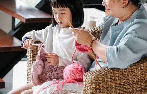 Free Mother and Daughter Doing Crafting Activities Stock Photo