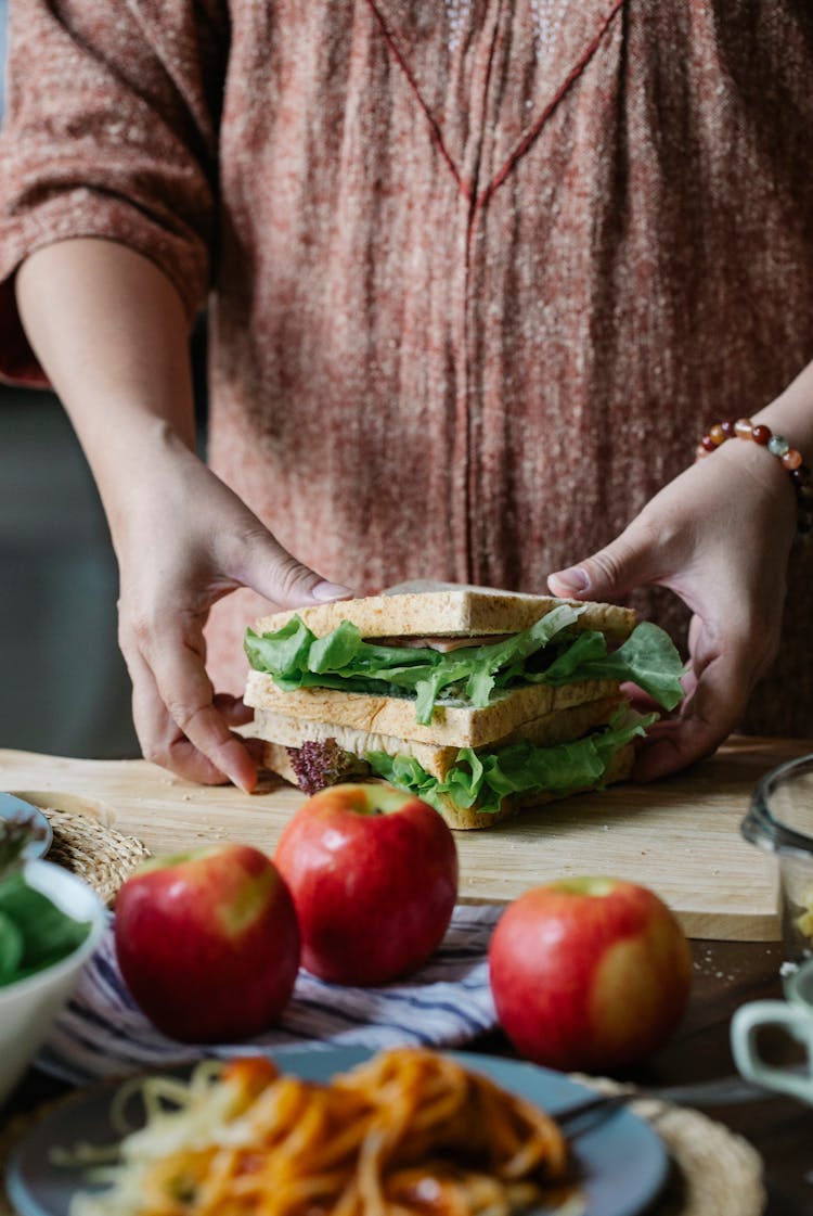 Crop Faceless Woman Preparing Healthy Sandwich