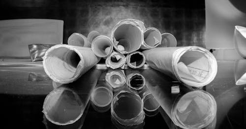 Free Set of paper rolls on table Stock Photo