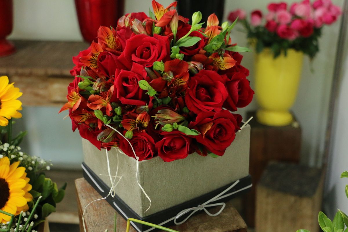 Red rose arrangement in an elegant box