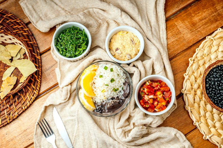 Delectable Rice With Bean Stew Served With Tomatoes And Parsley