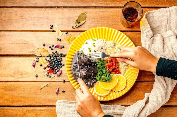 Crop Unrecognizable Person Eating Delicious Brazilian Feijoada Dish