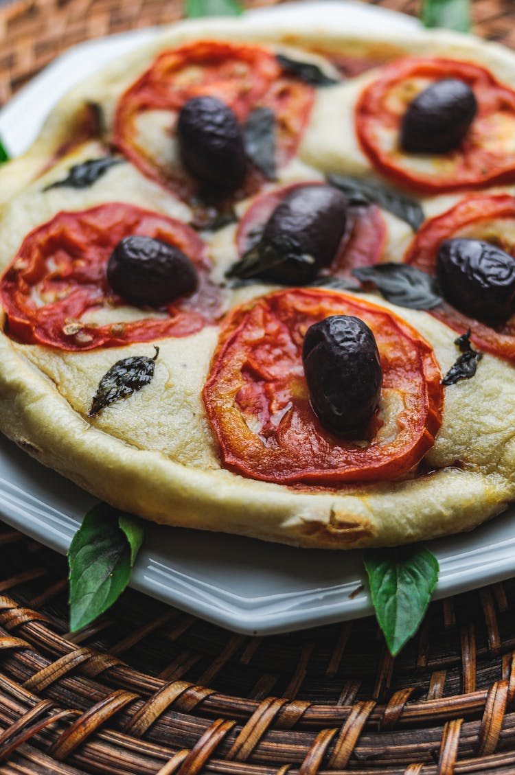 Fresh Pizza With Dried Tomato On Dish