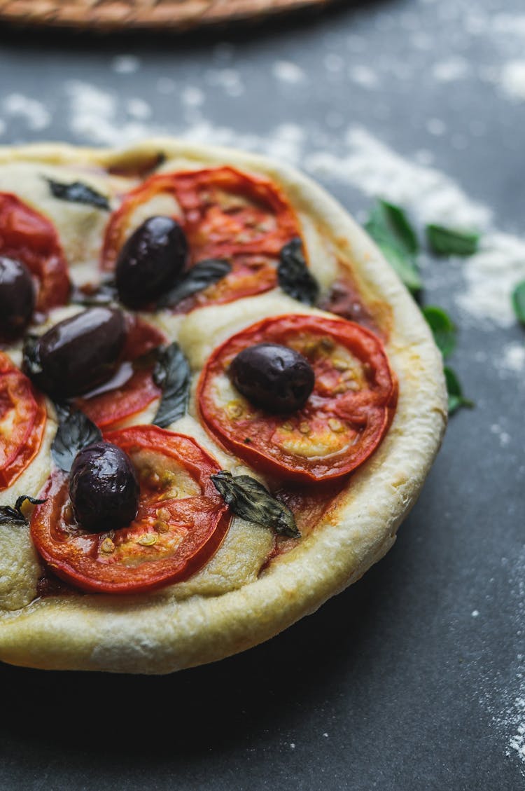 Tasty Fresh Pizza With Tomato And Olive