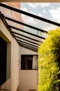Glassed in porch with glass roof