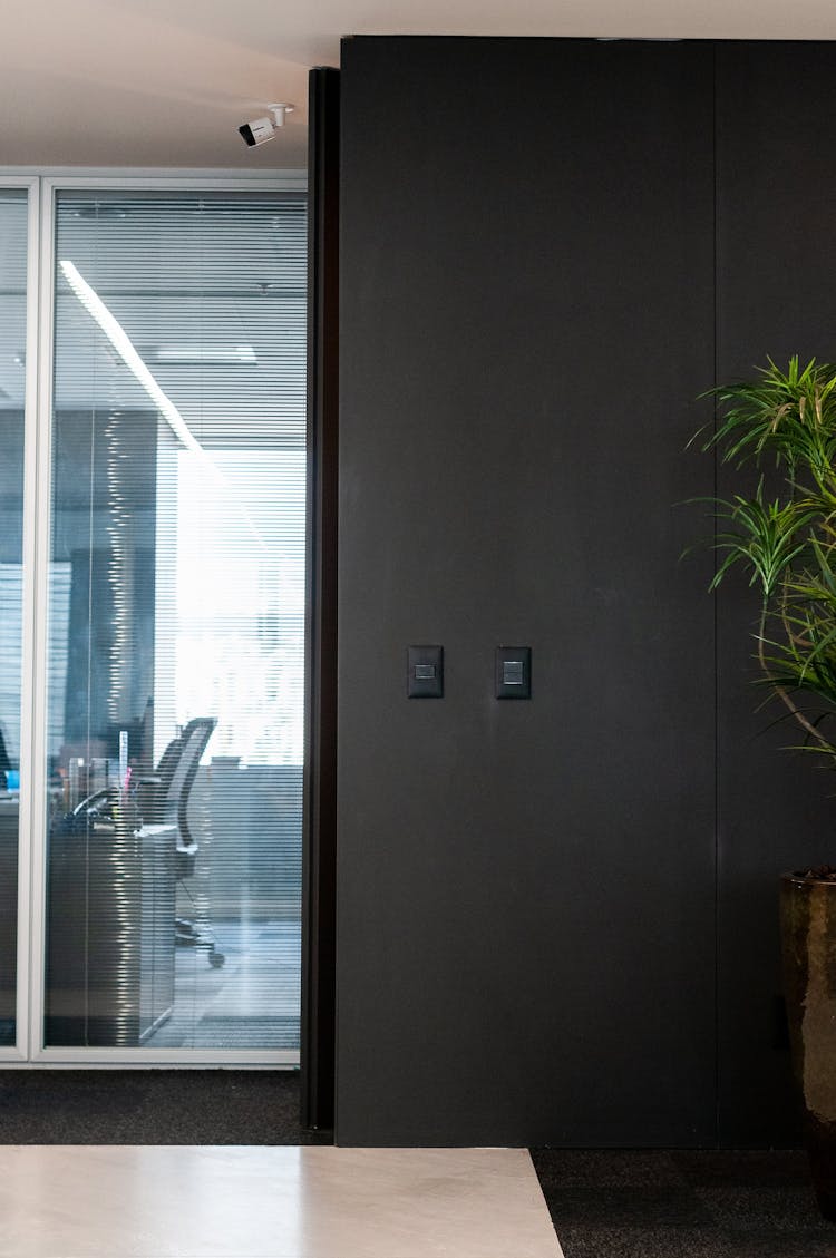 Stylish Interior Of Office Room With Mirrored Cabinet