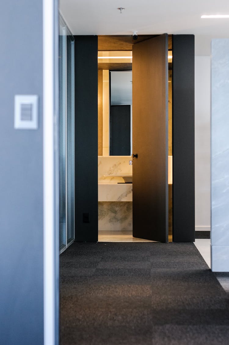 Corridor Of Modern Apartment Building To Bathroom